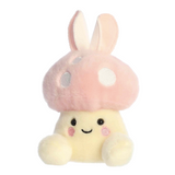 Plush toy with a pink mushroom cap and yellow body on a white background