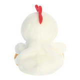 White plush toy resembling a chicken with a red comb on a white background