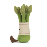 Plush toy asparagus with a green leafy top and brown stem on a white background