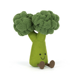 Toy broccoli with a smiling face on a white background