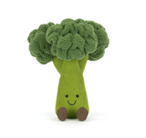 Toy broccoli with a smiling face on a white background