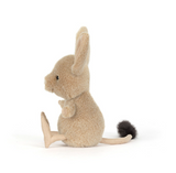 Stuffed animal toy resembling a rabbit on a white background