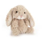 Plush bunny toy on a white background