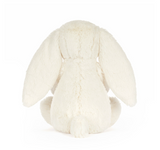 White plush bunny toy on a white background