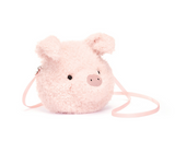 Pink pig-shaped crossbody bag on a white background