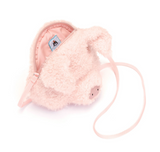 Pink plush toy with a string on a white background