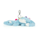 Plush dinosaur keychain on a white background