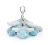 Plush keychain shaped like a blue and white creature with a tag on a white background