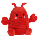 Red plush toy with a smiling face on a white background
