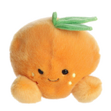 Plush toy carrot with a smiling face on a white background