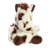 Plush giraffe toy with brown spots on a white background
