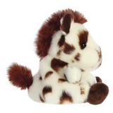 Plush toy resembling a skunk on a white background