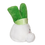 Plush toy shaped like a white rabbit with green ears on a white background