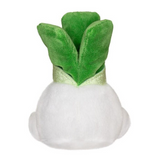 Plush toy shaped like a turnip with green leaves on a white background