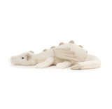 Plush toy alligator on a white background