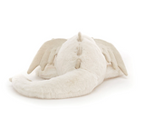 White plush toy with bunny ears on a white background