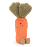 Plush carrot toy with a smiling face on a white background