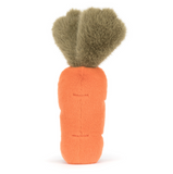 Carrot-shaped plush toy with green top on a white background