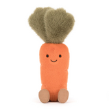 Plush carrot toy with green leaves on a white background