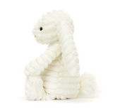 White plush toy on a white background