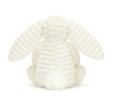 White textured plush bunny toy on a white background