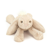 Plush bunny toy on a white background