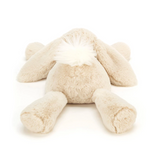 White plush bunny toy on a white background