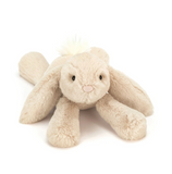 Plush bunny toy on a white background