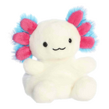 Plush toy with a cute face and pink and blue flower-like appendages on a white background