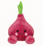 Plush toy shaped like a radish with a smiling face on a white background