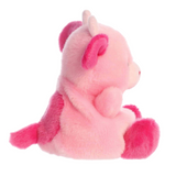 Pink plush toy with a horn on a white background