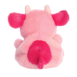 Pink plush toy with a heart design on a white background