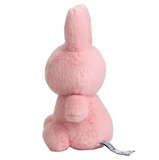 Pink plush bunny toy on a white background