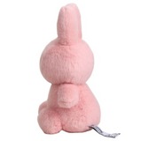 Pink plush toy with bunny ears on a white background