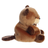 Plush toy otter sitting on a white background
