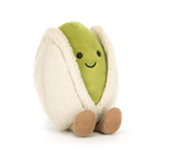 Plush toy in the shape of a pistachio with a smiling face on a white background