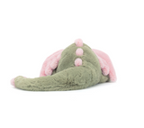 Green and pink plush toy resembling a dinosaur on a white background