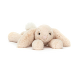 Plush bunny toy on a white background