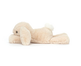 Cream-colored bunny plush toy on a white background