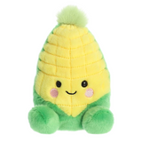 Plush toy resembling a corn on the cob with a smiling face on a white background