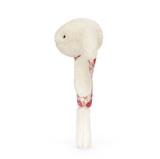 White plush rattle with floral pattern on a white background