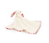 White bunny comfort blanket with floral trim on a white background