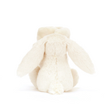 White plush bunny toy on a white background