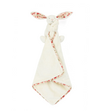 White plush toy with red floral patterns on a white background