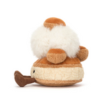 Small plush toy resembling a gnome with a white beard on a white background