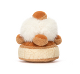 Small plush gnome with brown and white fur on a white background
