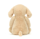 Beige plush bunny toy on a white background