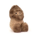 A plush stuffed animal shaped like a lion, featuring a fluffy brown mane and a lighter tan body, photographed against a clean white background.