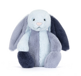 Plush toy rabbit with gray and white fur on a white background