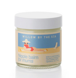 A glass jar of Willow by the Sea Nipple Balm for Mums with a white lid and a retro beach-themed label, set against a clean white background.